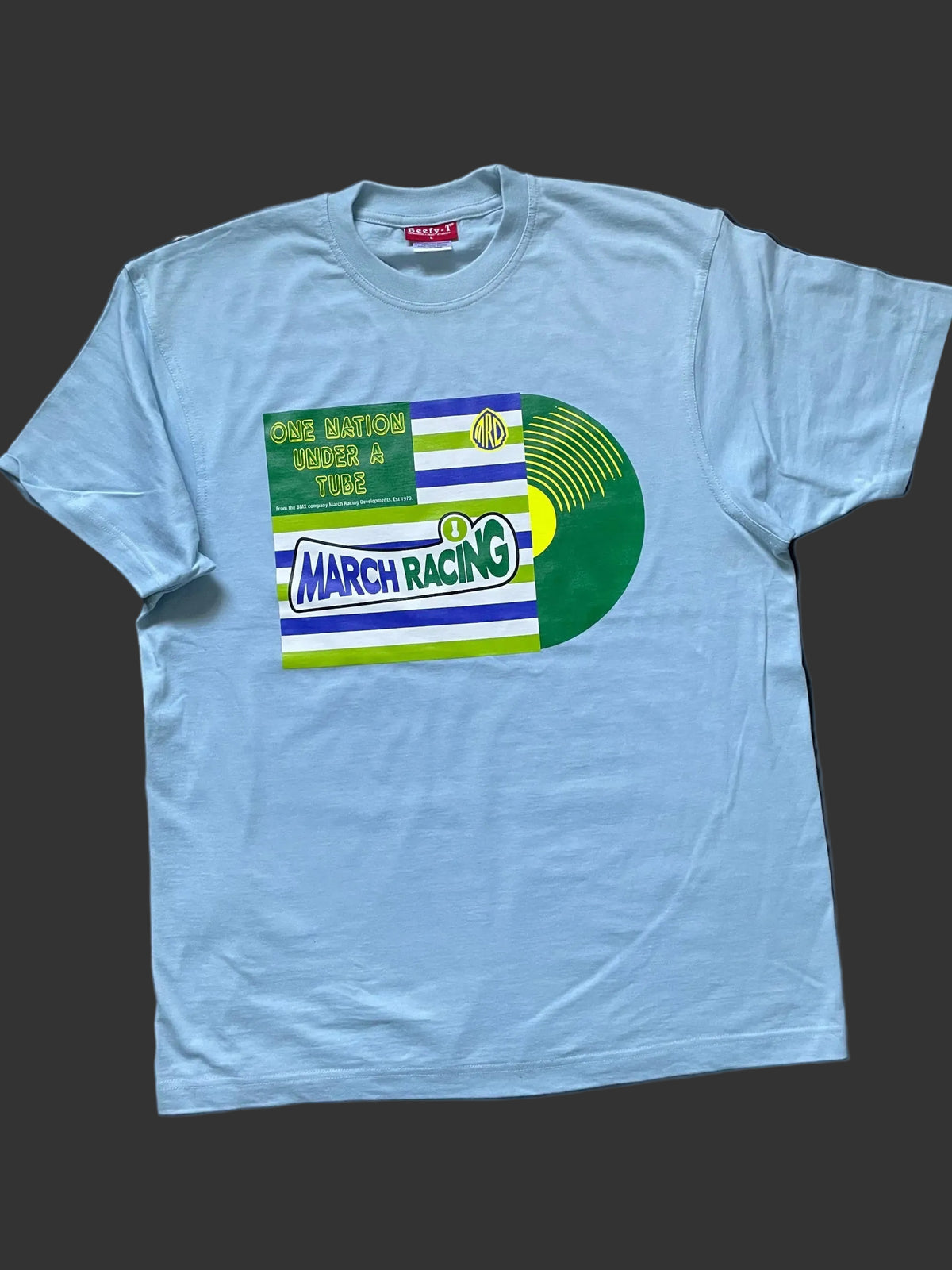 Sky blue MRD One Nation Under a Tube short-sleeve T-shirt with four-colour chest graphic.